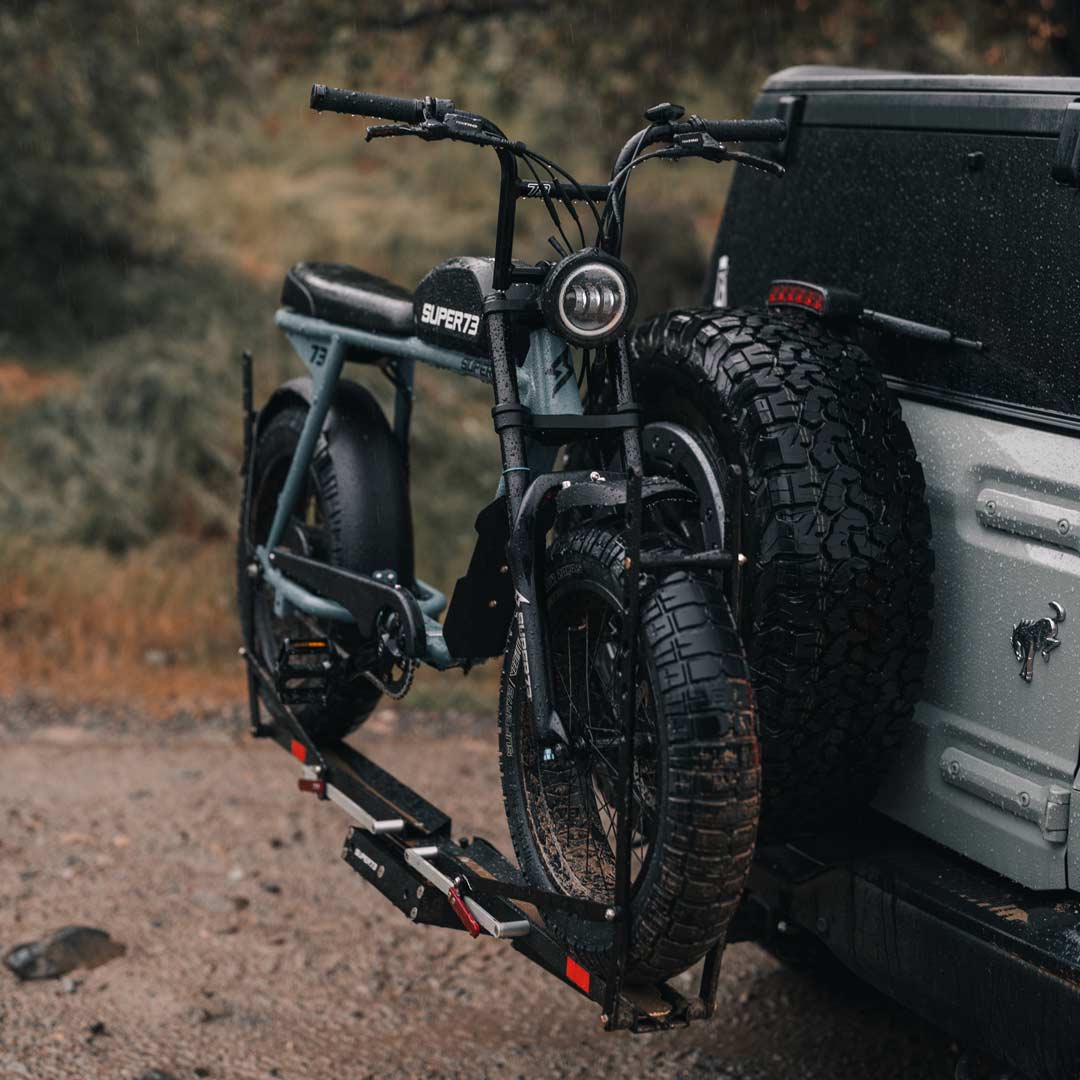 SUPER73-S2 ebike attached to the 1UP USA x SUPER73 Bike Rack on the back of a Ford Bronco.