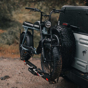 SUPER73-S2 ebike attached to the 1UP USA x SUPER73 Bike Rack on the back of a Ford Bronco.